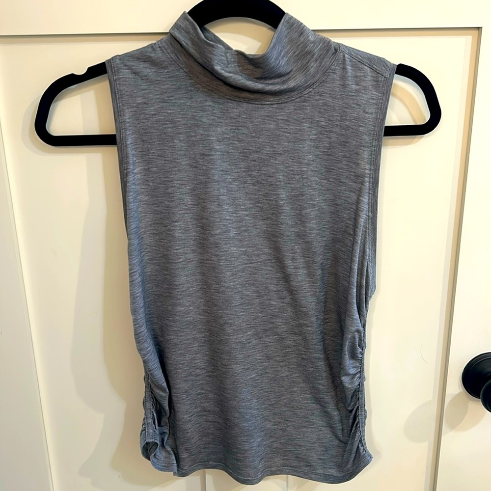 Ruched-side, mock-neck Lululemon tank.  Size 4.  In excellent condition.